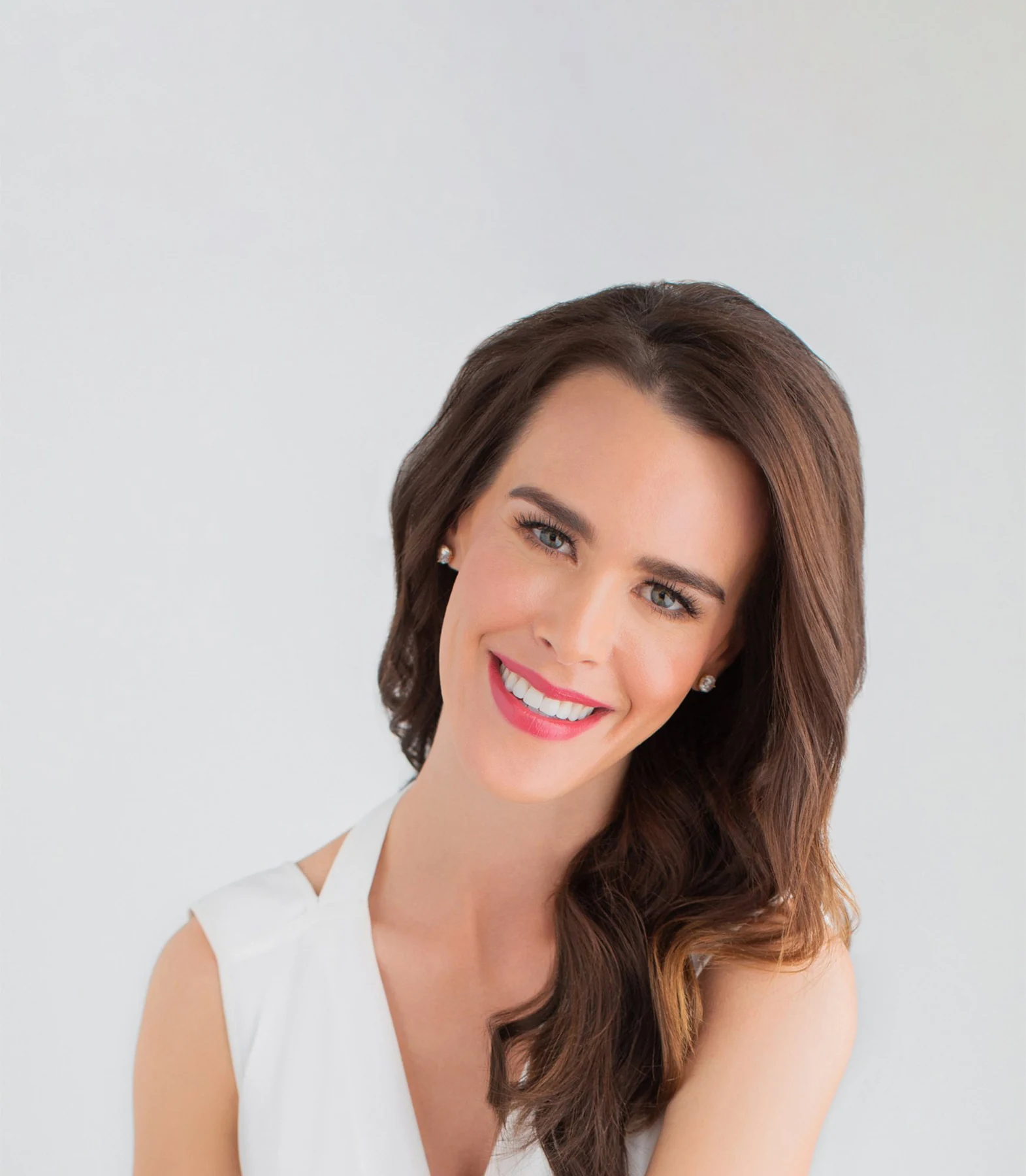 Featured studio portrait retouching against a plain background