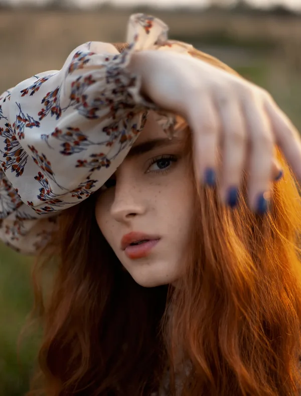 Outdoor fashion editorial portrait in golden-hour light after retouching