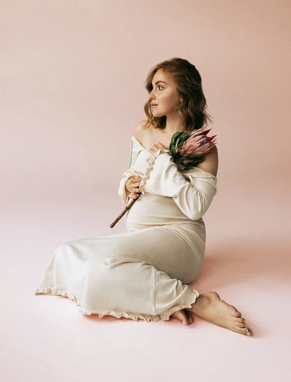 Styled gown maternity portrait after colour retouching